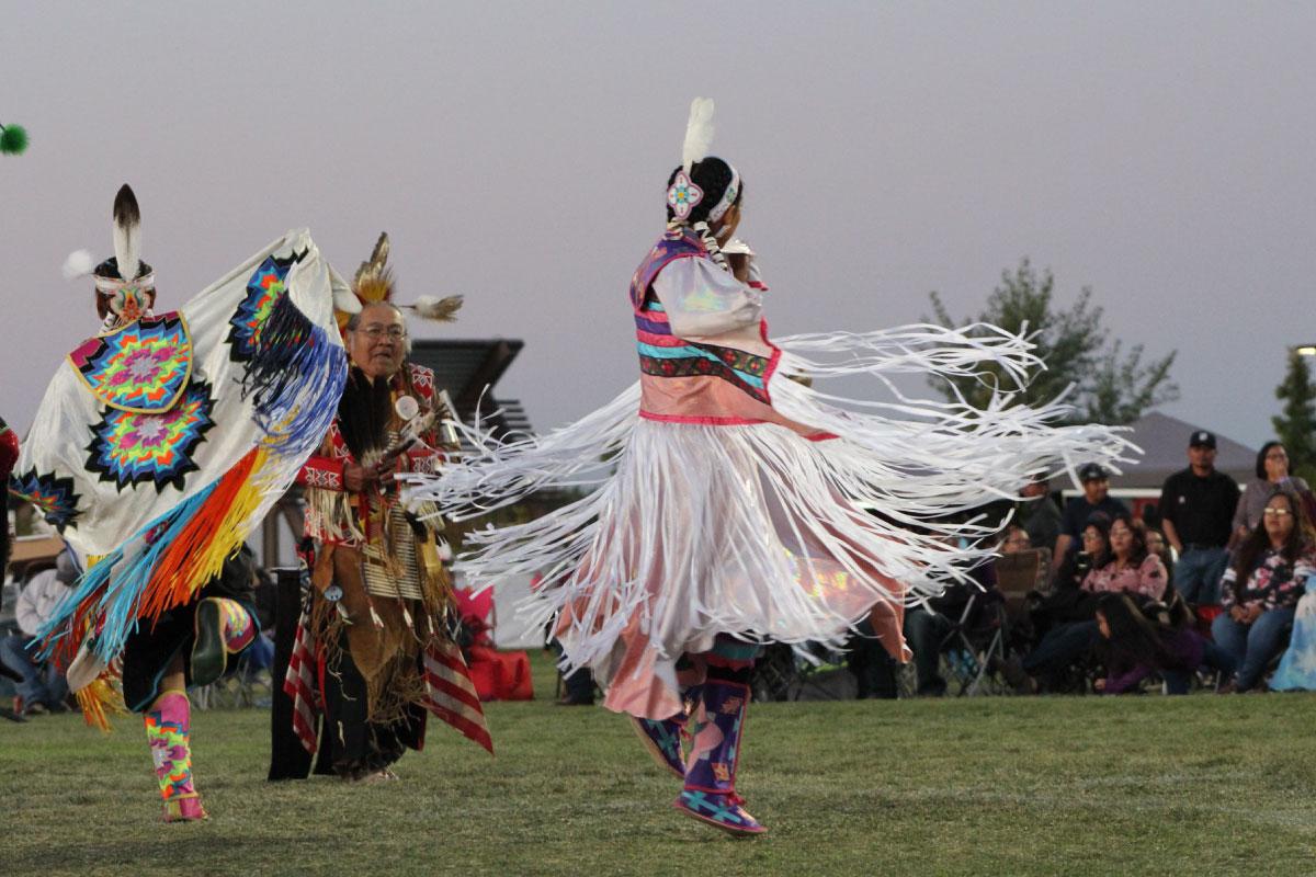 Native American performing the Spring gord dance in traditional clothing